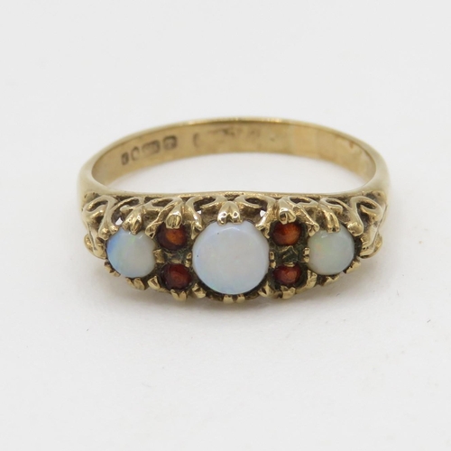 147 - 9ct gold opal and garnet ornate ring (2.1g) Size N