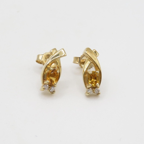 157 - 9ct gold citrine & diamond stud earrings (1.6g)