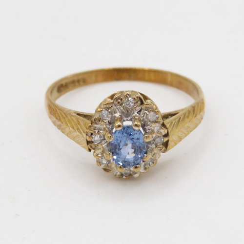 184 - 9ct gold diamond and sapphire halo ring (1.9g) Size M