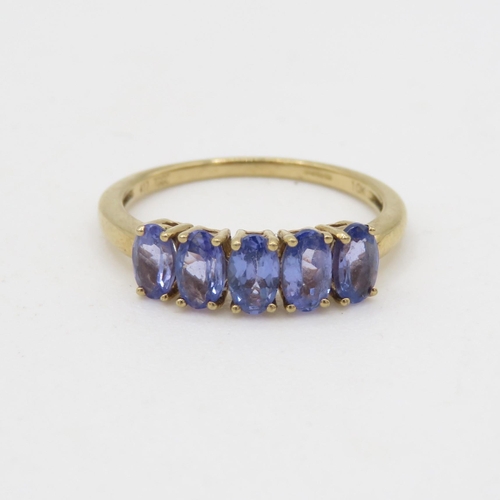 194 - 9ct gold five stone tanzanite ring (1.6g) Size M