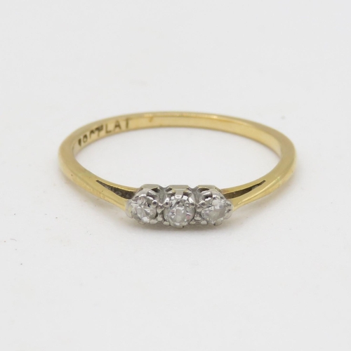 195 - 18ct gold and platinum diamond trilogy ring (1.5g) Size M