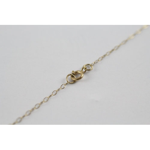 104 - 9ct gold diamond and tanzanite flower pendant chain (1g)