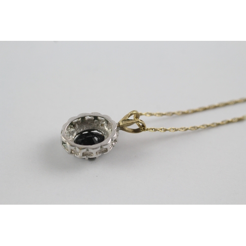 112 - 9ct gold sapphire and diamond halo pendant on chain (2.3g)