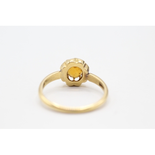 130 - 18ct gold and citrine ring (3.6g) Size Q