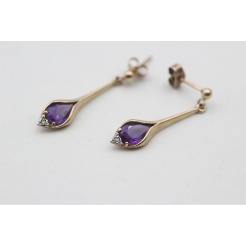 135 - 9ct gold amethyst and diamond set drop earrings (2g)