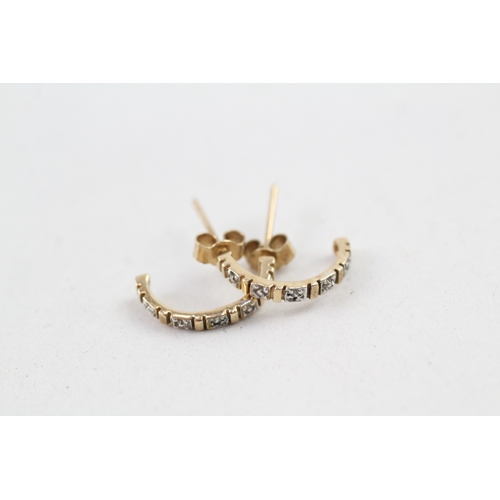 139 - 9ct gold diamond c-hoop earrings (0.9g)