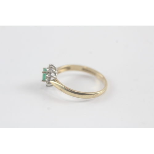 140 - 9ct gold emerald and diamond halo ring (1.7g) Size N