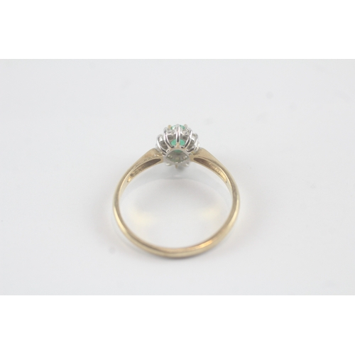 140 - 9ct gold emerald and diamond halo ring (1.7g) Size N