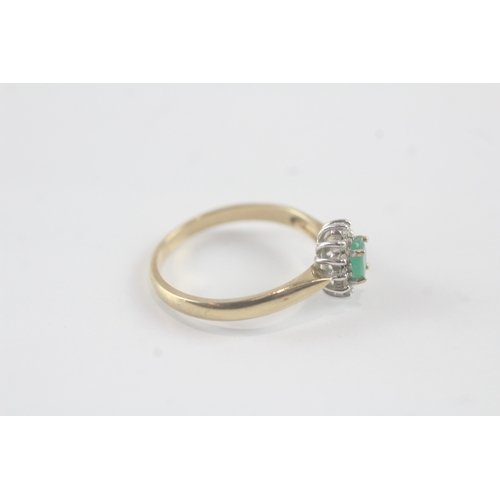 140 - 9ct gold emerald and diamond halo ring (1.7g) Size N