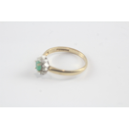 140 - 9ct gold emerald and diamond halo ring (1.7g) Size N