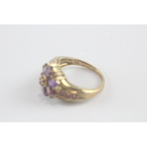 143 - 9ct gold diamond, amethyst, garnet and tourmaline dress ring (4.5g) Size M