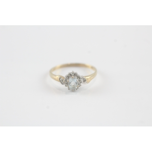 144 - 9ct gold diamond and aquamarine halo ring (1.6g) Size P