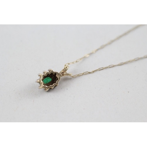 169 - 9ct gold emerald & diamond pendant necklace (0.9g)