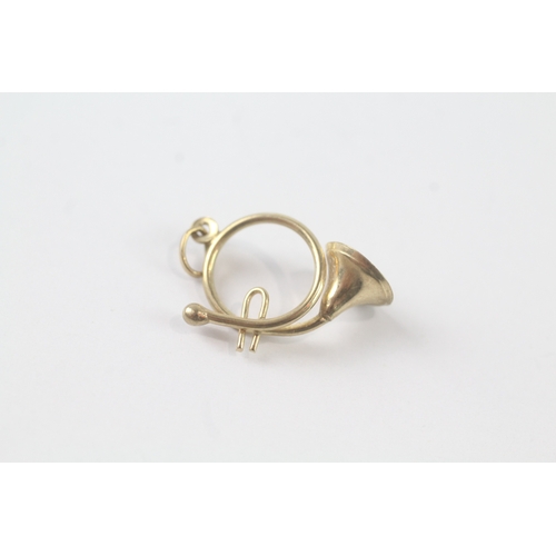 172 - 9ct gold trumpet charm (0.9g)