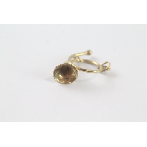 172 - 9ct gold trumpet charm (0.9g)