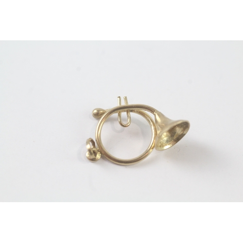 172 - 9ct gold trumpet charm (0.9g)