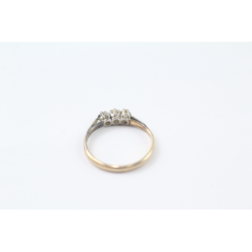 175 - 9ct gold three stone diamond ring (1.3g) Size L