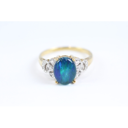 176 - 9ct gold diamond and opal triplet framed ring (2.9g) Size P 1/2