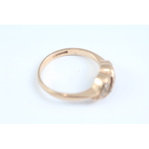 177 - 9ct gold diamond twist ring (2.8g) Size M