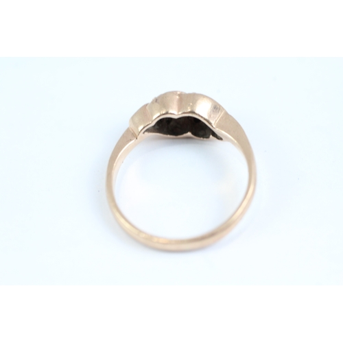 177 - 9ct gold diamond twist ring (2.8g) Size M