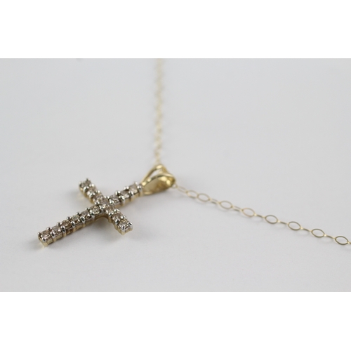 186 - 9ct gold diamond cross pendant on chain (1.4g)