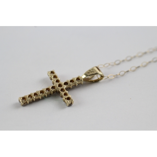 186 - 9ct gold diamond cross pendant on chain (1.4g)