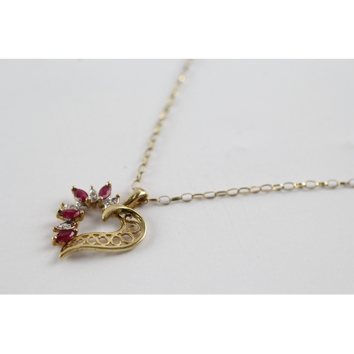 187 - 9ct gold ruby and diamond half heart pendant on chain (2g)