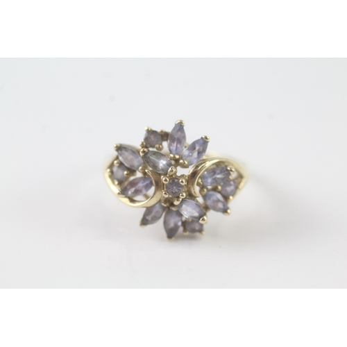 192 - 9ct gold tanzanite cluster ring (3.1g) Size O