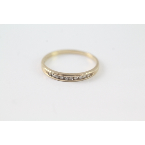 193 - 9ct gold diamond channel set ring (1.2g) Size N