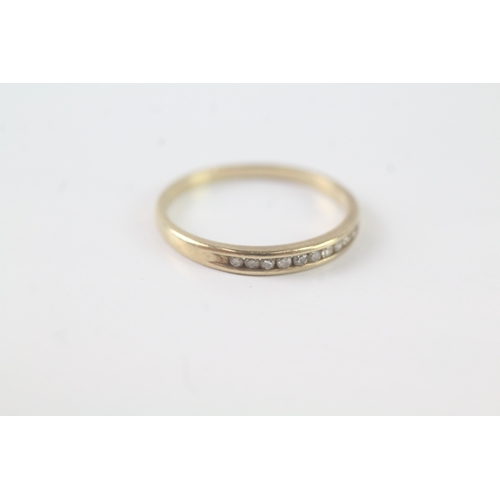 193 - 9ct gold diamond channel set ring (1.2g) Size N