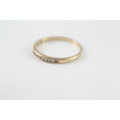 193 - 9ct gold diamond channel set ring (1.2g) Size N