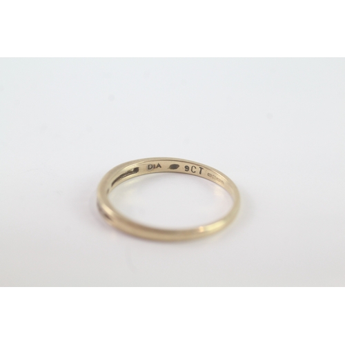 193 - 9ct gold diamond channel set ring (1.2g) Size N