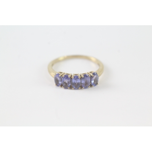 194 - 9ct gold five stone tanzanite ring (1.6g) Size M