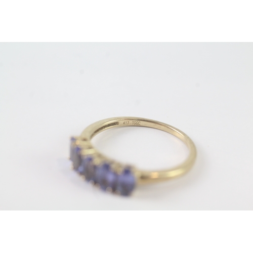 194 - 9ct gold five stone tanzanite ring (1.6g) Size M