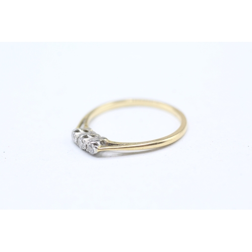 195 - 18ct gold and platinum diamond trilogy ring (1.5g) Size M