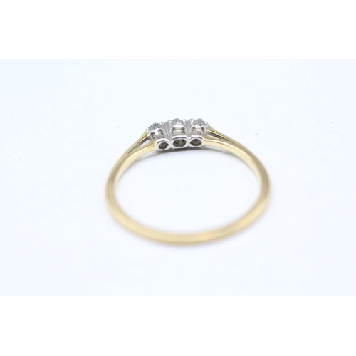 195 - 18ct gold and platinum diamond trilogy ring (1.5g) Size M