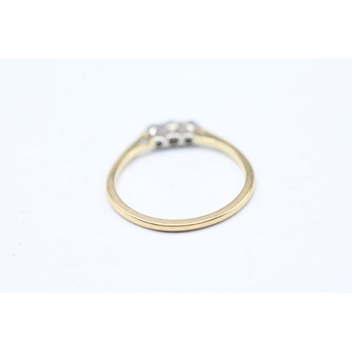 195 - 18ct gold and platinum diamond trilogy ring (1.5g) Size M