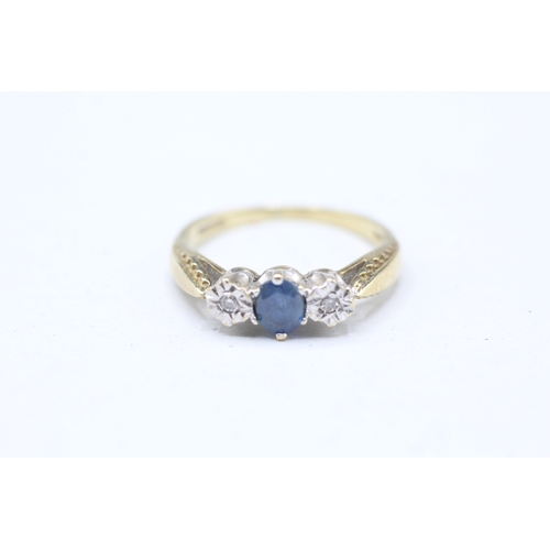 20 - 9ct gold illusion set diamond and sapphire trilogy ring (2.3g) Size M