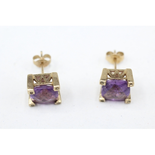 26 - 9ct gold amethyst and white gemstone stud earrings (3.8g)