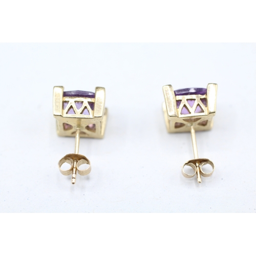 26 - 9ct gold amethyst and white gemstone stud earrings (3.8g)