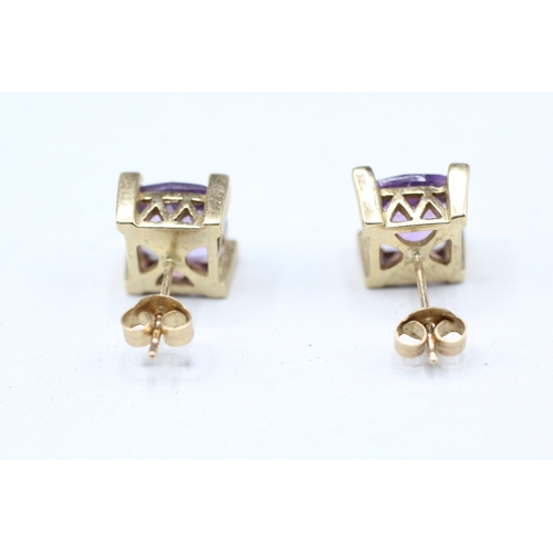 26 - 9ct gold amethyst and white gemstone stud earrings (3.8g)