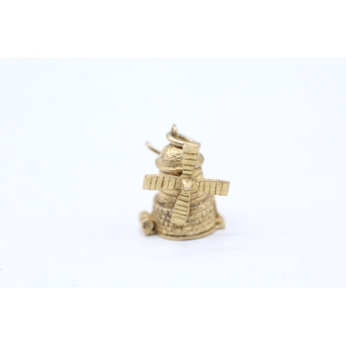 27 - 9ct gold opening windmill charm (2.6g)