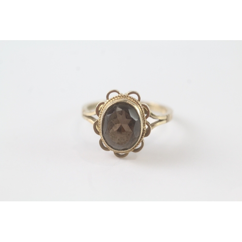 33 - 9ct gold smokey quartz ring (2.9g) Size N