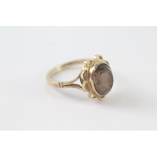 33 - 9ct gold smokey quartz ring (2.9g) Size N