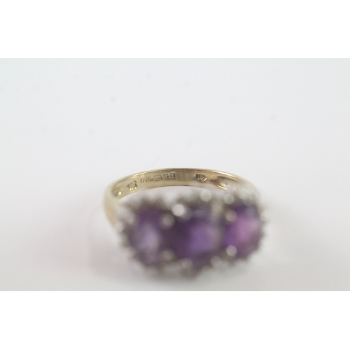 34 - 9ct gold three stone amethyst and diamond ring (2.9g) Size M