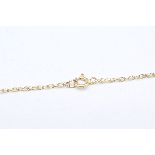 42 - 9ct gold bi colour diamond set pendant with chain (1.8g)