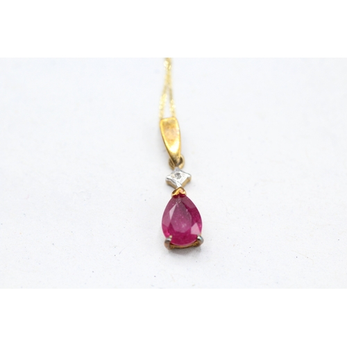 55 - 9ct gold diamond and ruby set pendant and chain (1g)