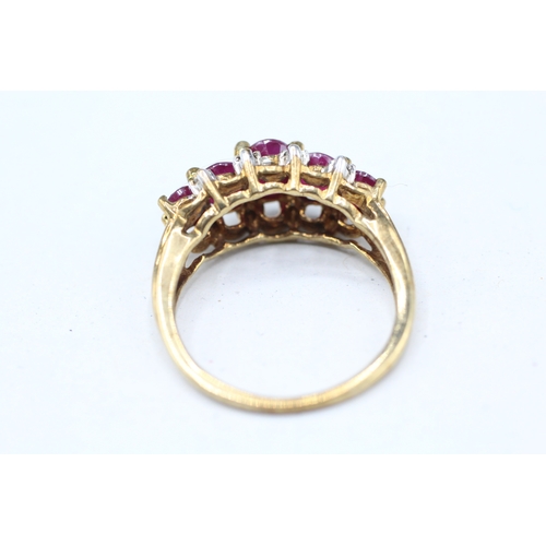 6 - 9ct gold diamond and enhanced ruby set dress ring (3.5g) Size N