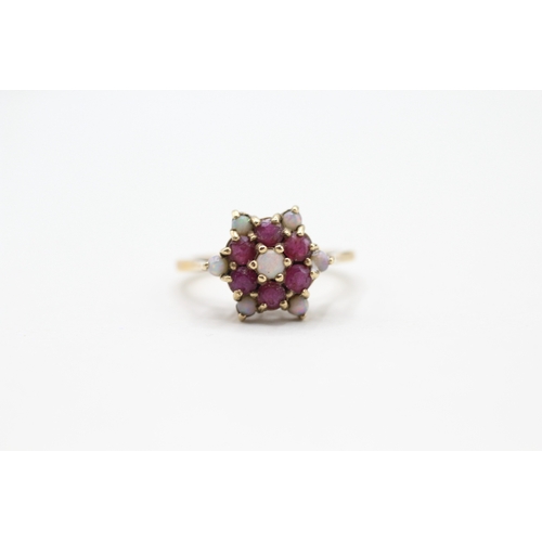 68 - 9ct gold opal and ruby cluster set ring (3g) Size M