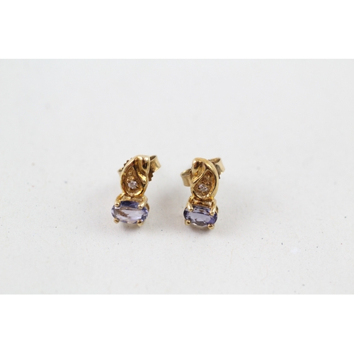 73 - 9ct gold iolite & diamond stud earrings (1.1g)